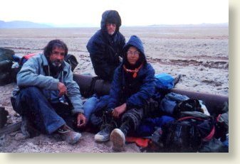 From Left - Lee Bergthold, Al Caler, Tina Bowers crossing Bristol Dry Lake south of Amboy. Self timed photo by Lee Bergthold